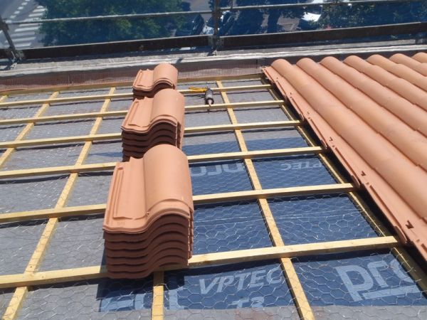 Pose de la nouvelle couverture